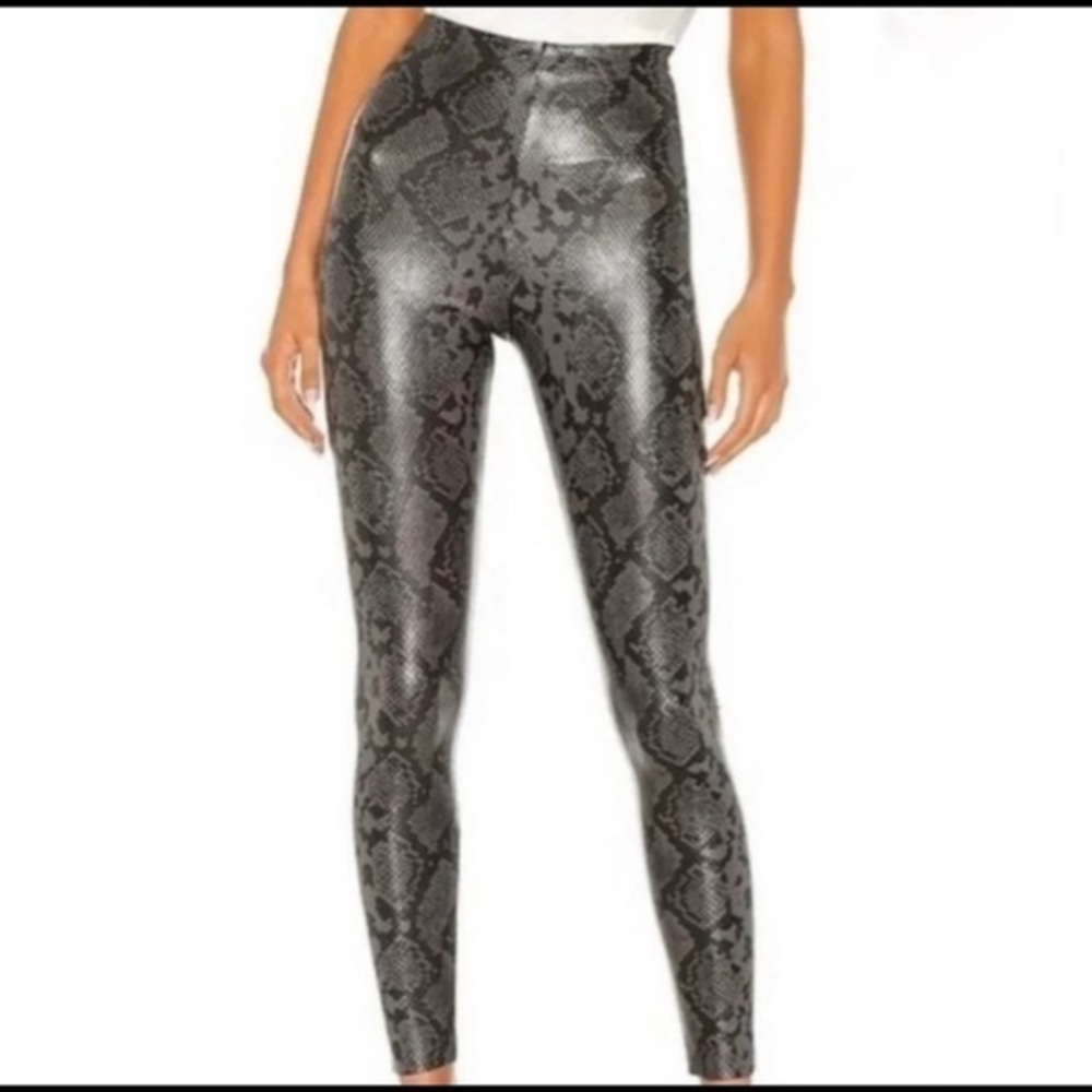 7 for all mankind faux leather snake skin leggings.  NWT size small.